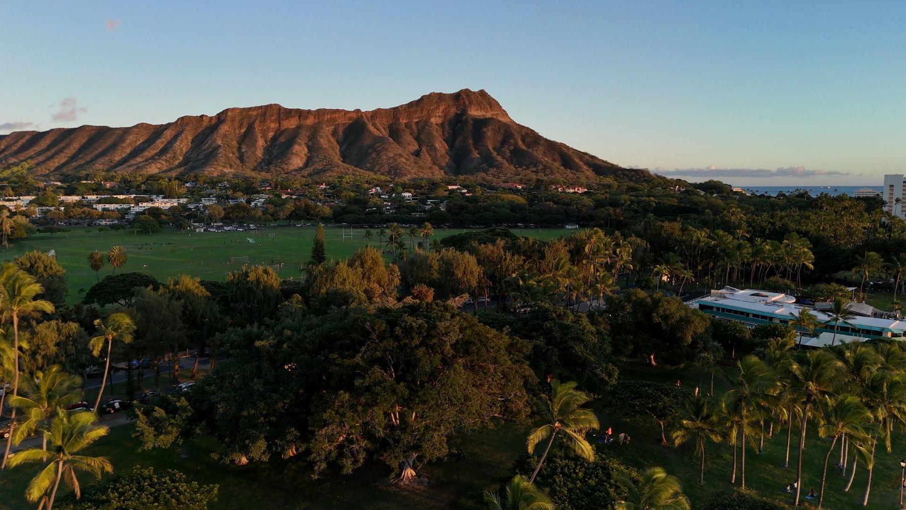 Kapiolani Park at golden hour with Diamond Head behind